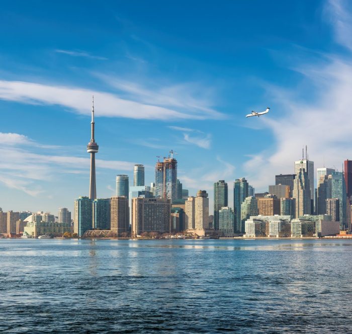Toronto skyline showcasing iconic landmarks for English learners